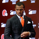 Cleveland Browns quarterback Deshaun Watson enters a news conference at the NFL football team’s training facility, on March 25, 2022, in Berea, Ohio. The NFL suspended Watson for six games on Monday, Aug. 1, 2022 for violating its personal conduct policy following accusations of sexual misconduct made against him by two dozen women in Texas, two people familiar with the decision said.